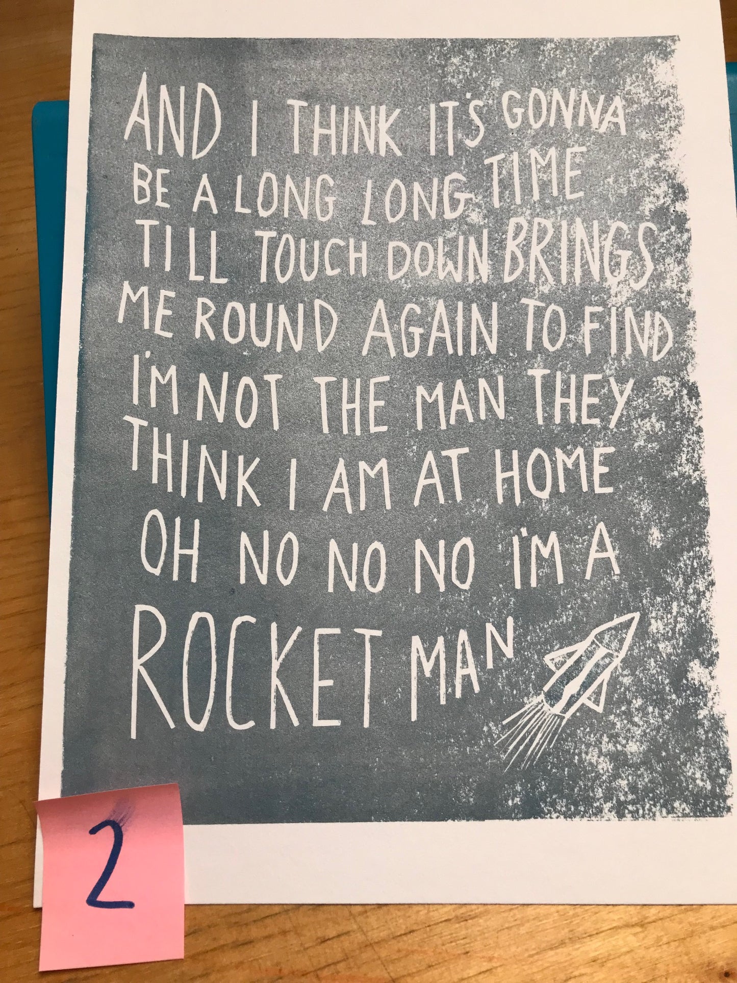 SUPER SECONDS Elton John 'Rocket Man' lyrics linocut in silver grey or blue