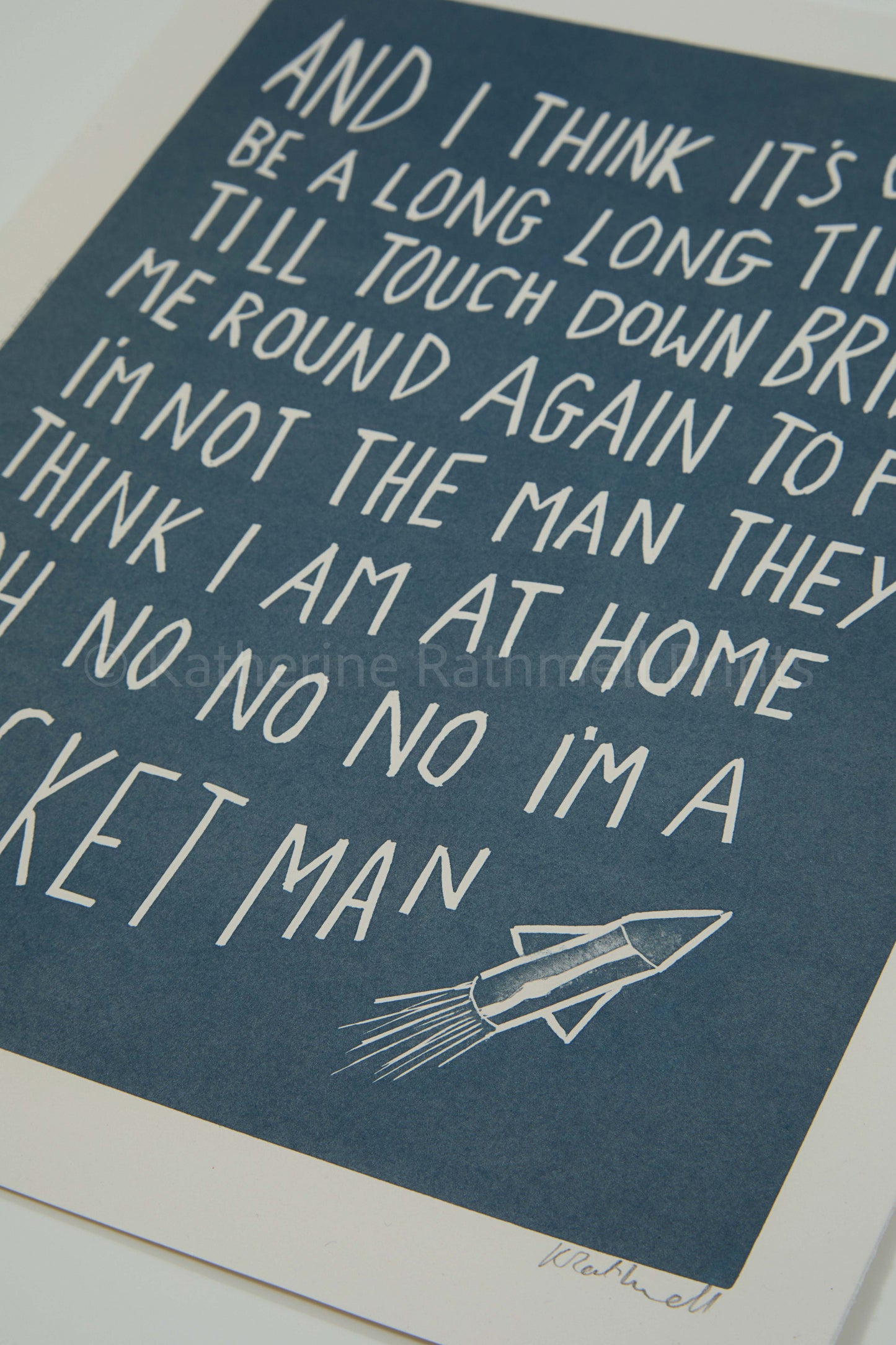 Elton John 'Rocket Man' lyrics linocut in silver grey or blue