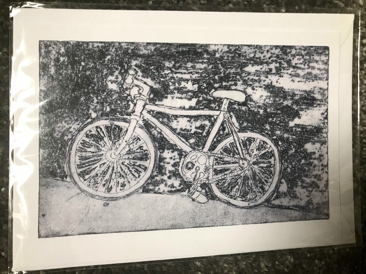 Blank greetings cards of linocut flowers, and etchings of a bike and a french maid (OLD STOCK not seconds)