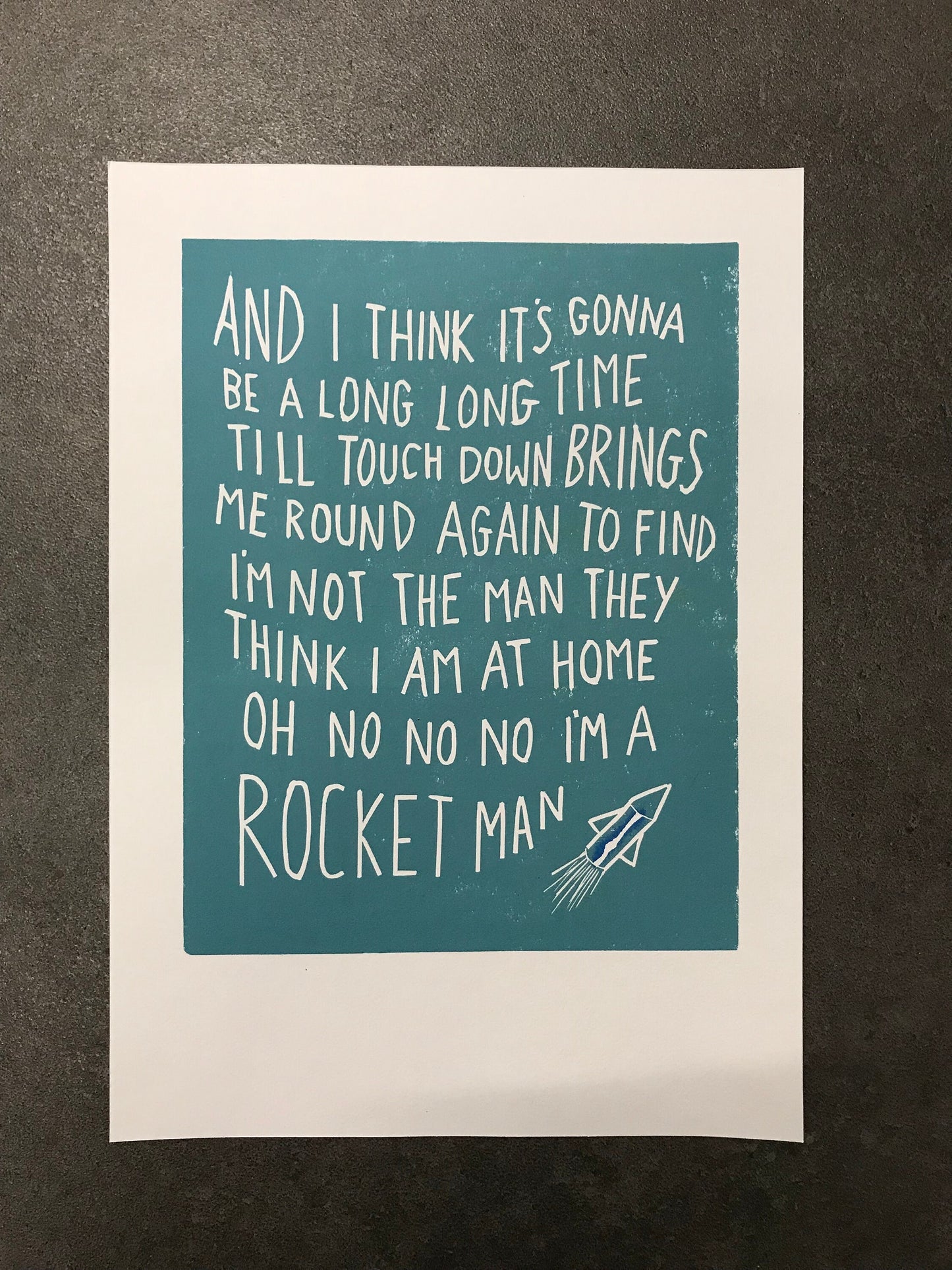 Elton John 'Rocket Man' lyrics linocut in silver grey or blue